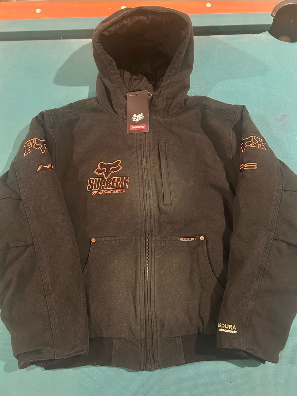 Supreme Black Hooded Puffer Jacket with Orange Logos